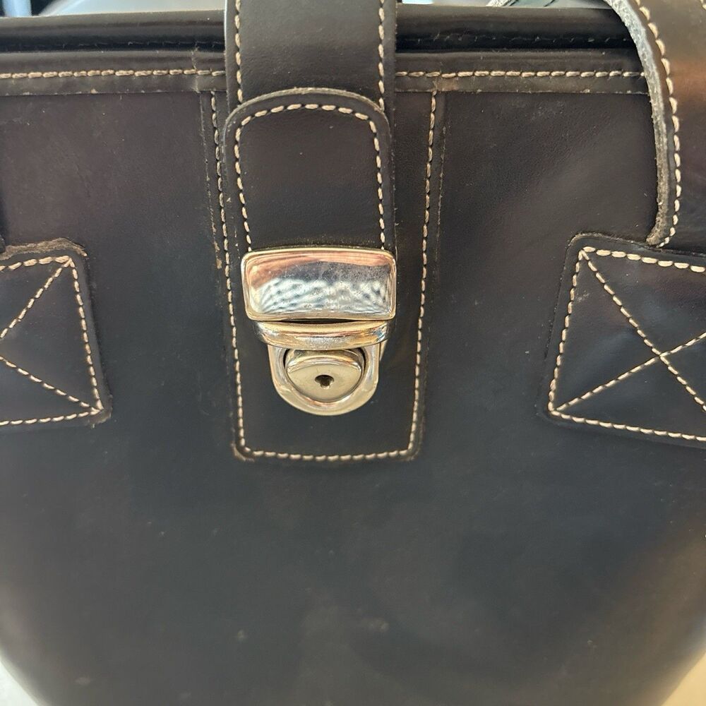 Vintage 1998 Dooney And Bourke Tall Dark Brown Leather Purse In Good Condition.
